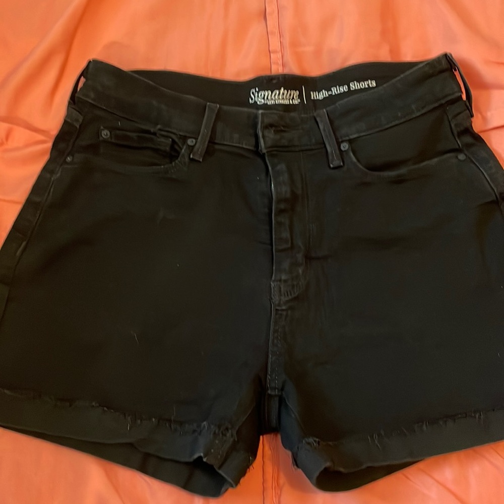 Levi high waist ladies shorts , 14 inches flat waist @7” from crotch to hem!